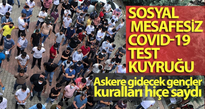 Sosyal mesafesiz Covid-19 test kuyruğu