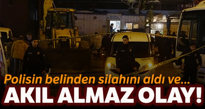 Kavgayı ayırmaya çalışan polisi, belinden aldığı silahıyla vurdu