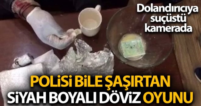 'siyah boyalı dövizle' dolandırmaya çalışan şahsa suçüstü kamerada