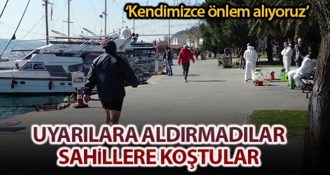 Tüm uyarılara rağmen evde kalmayıp sahile koştular