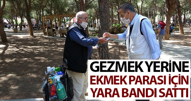 Sokağa çıkma izninde gezmek yerine ekmek parası için yara bandı sattı